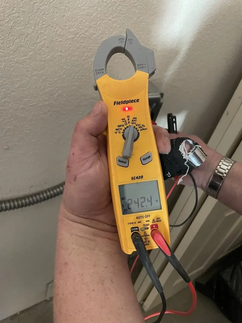 Voltage testing with clamp meter during Circuit Breaker Repair in Beckley